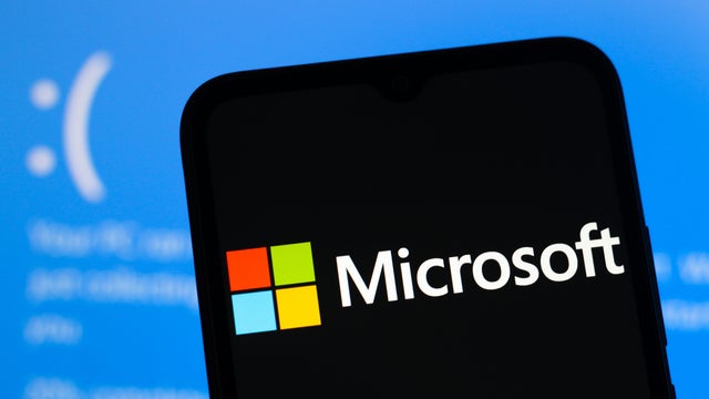 In this photo illustration, the Microsoft Corporation logo 